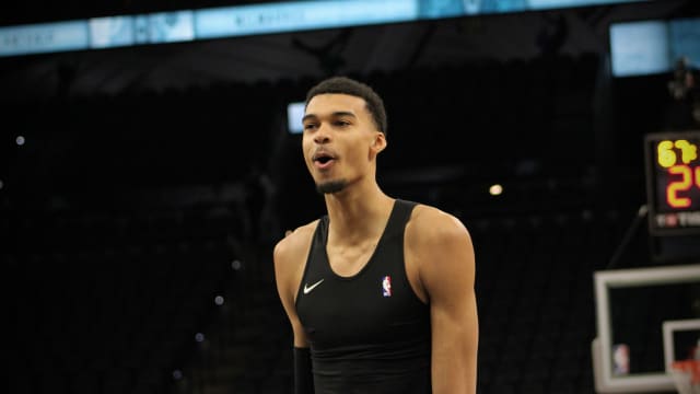 Jan 4, 2024; San Antonio, Texas, USA; San Antonio Spurs forward Victor Wembanyama (1) reacts during warmups prior to facing Giannis Antetokounmpo and the Milwaukee Bucks.